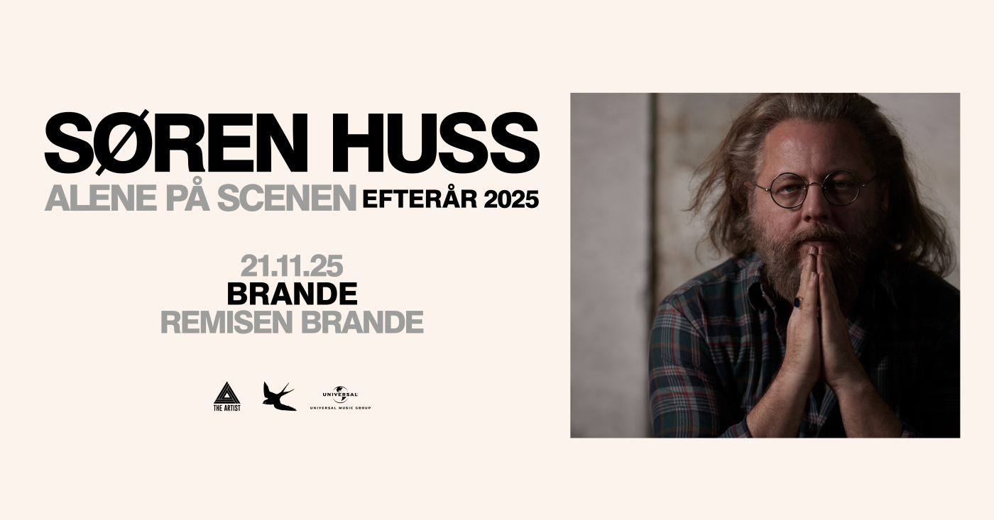 En poster. På billedet kan man se tekst til venstre og en mand til højre. Han har brunt hår, skæg og briller på.
